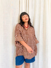 Load image into Gallery viewer, Front view of the Signature Big Shirt showing oversized fit and wide sleeves that are able to be buttoned up.