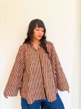 Load image into Gallery viewer, Front view of the Signature Big Shirt showing oversized fit and wide sleeves in brown stripes and 100% cotton.