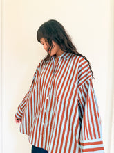 Load image into Gallery viewer, Model wearing the Signature Big Shirt in blue and brown stripe, hand block-printed cotton