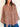 Front view of model wearing the Signature Big Shirt in brown stripe, block-printed cotton