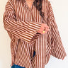 Model wearing the Signature Big Shirt showing wide sleeves and hand block-printed cotton fabric with sleeve buttons
