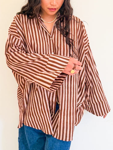 Model wearing the Signature Big Shirt showing wide sleeves and hand block-printed cotton fabric with sleeve buttons
