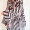 Model wearing the Signature Big Shirt in black stripe, showing oversized fit and hand block-printed cotton
