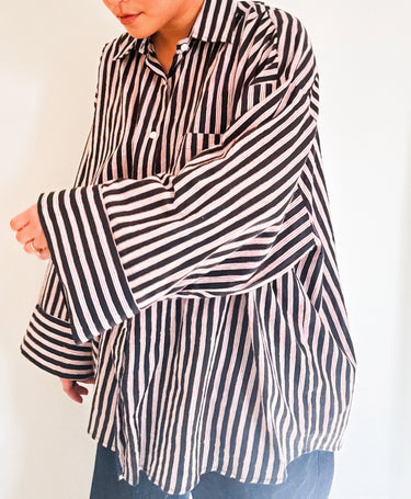 Model wearing the Signature Big Shirt in black stripe, showing oversized fit and hand block-printed cotton
