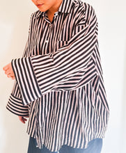 Load image into Gallery viewer, Model wearing the Signature Big Shirt in black stripe, showing oversized fit and hand block-printed cotton

